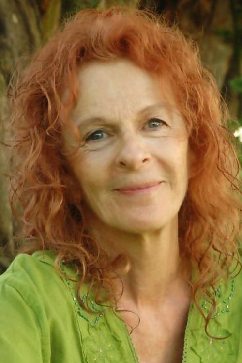 Nomi Sharron as Feather Woman