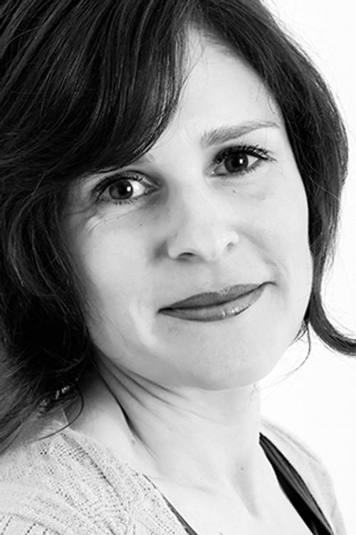 Alexia Murray as Interpreter