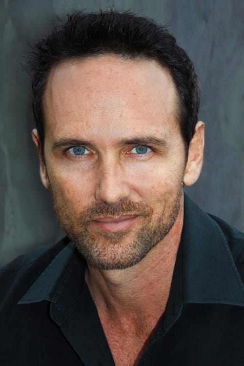 Victor Parascos as Helicopter Pilot