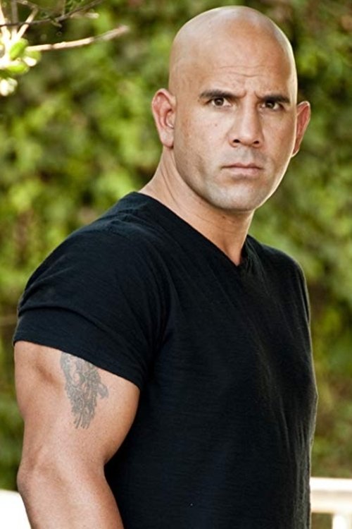 Tony Flores as Straightjacket Ghost (uncredited)