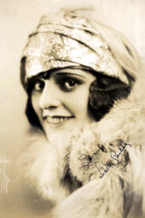 Lucille Carlisle as The daughter, the Blonde Flapper