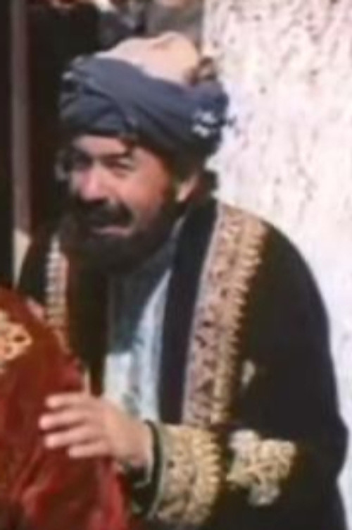 Khatam Nurov as Merchant