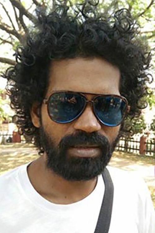 Murugan Martin as Nelson