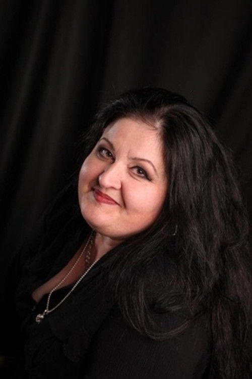 Dana Borteanu as Madam Pavlik