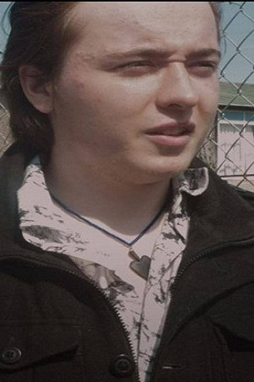 Ben McMorran as The Roommate