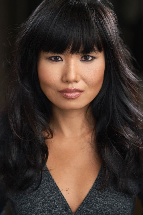 Aurora Chan as Female Hostage