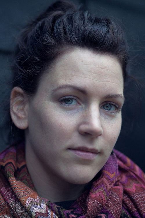 Linda Jacobsen as Ambassador