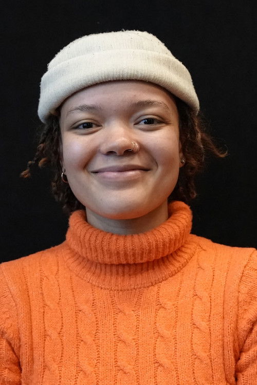 Sophia Holt as The Vendor