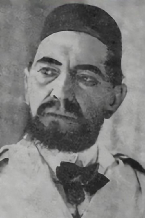 Iona Talanov as Antiques shop owner