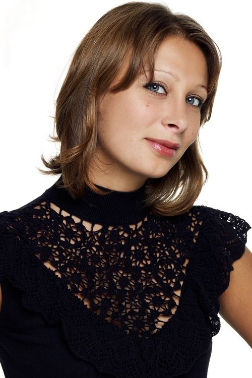 Katiuscia Canoro as Coach Sarah