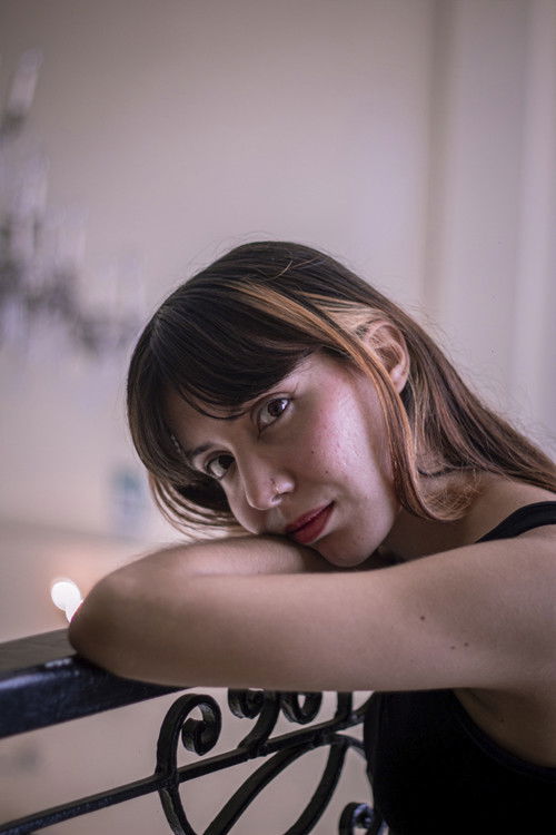 Fátima Rodríguez as Garret's friend