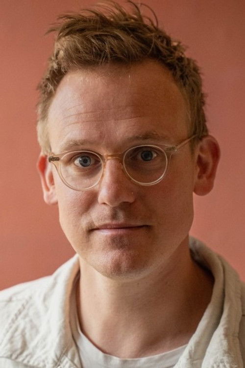 Daniel Rye as Photographer