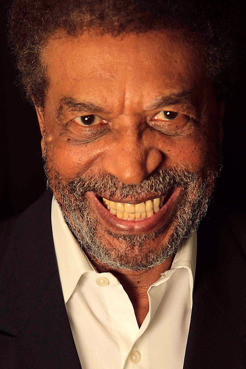 José María Kimbo as The Syphilitic Stricken Balloon Sales Gorilla