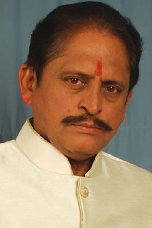 Ravindra Mankani as 
