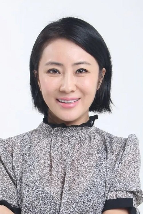Wang Siqin as May Chou's Mother