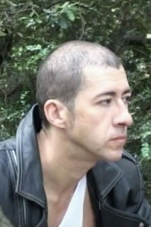 J.P. as Motard Assis