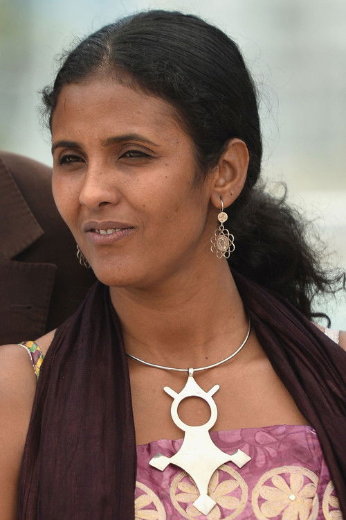 Toulou Kiki as Satima