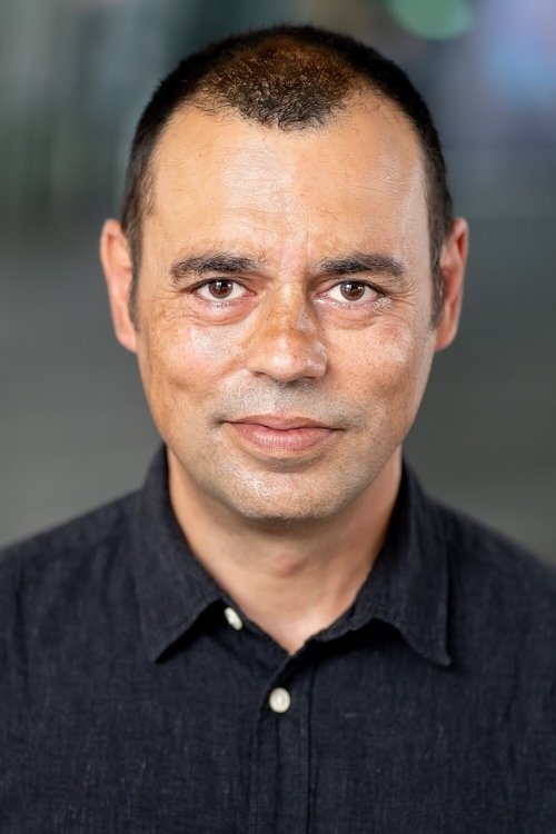 Emil Marwa as Assad Sarwar