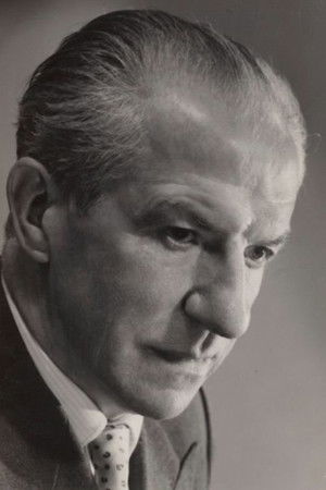 John Gobau as Directeur