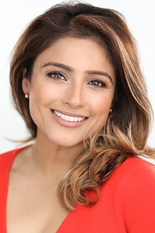 Meena Mann as Reporter