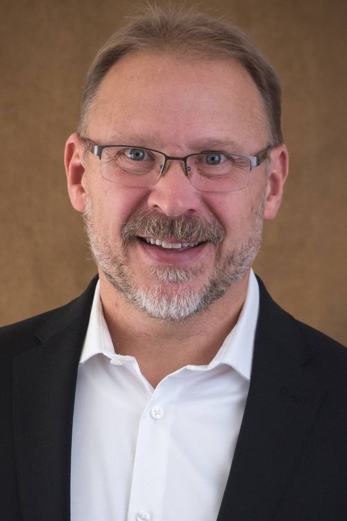 Joseph Moreland as Pastor Tom