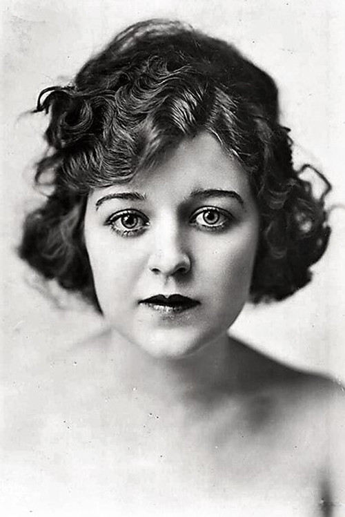 Marguerite Clayton as The School Teacher