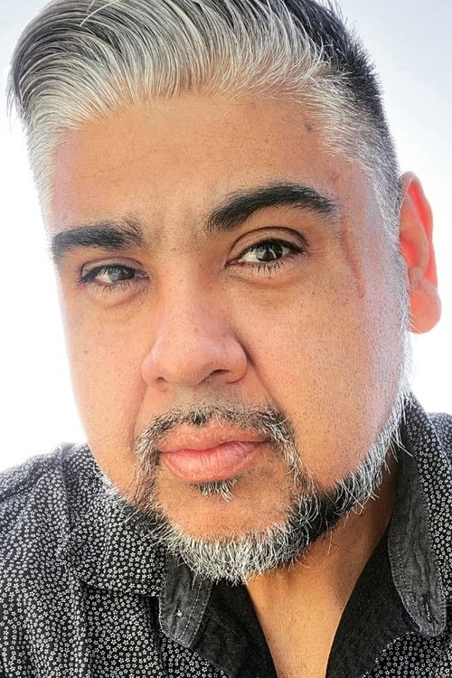 J.J. Fernandez as Bearded Street Vendor