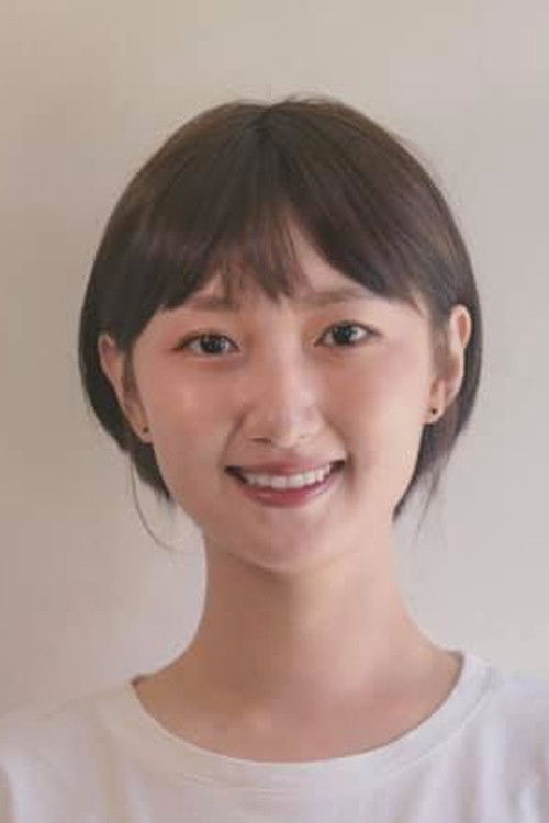 Rae Liu as Jewelry Store Owner