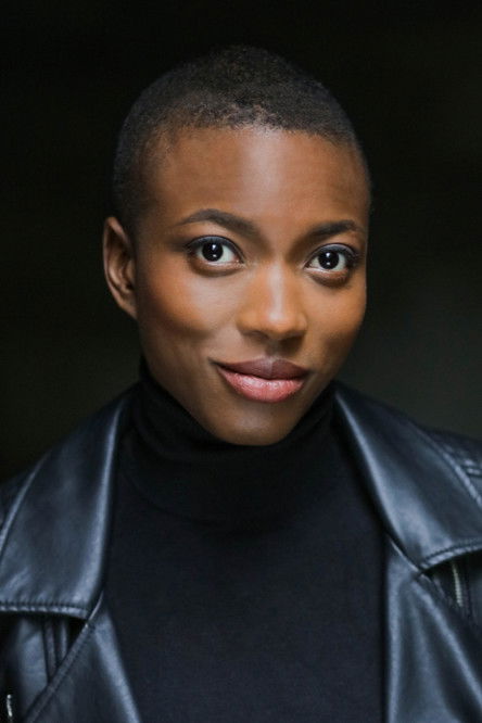 Céline Camara as Femme Guichet