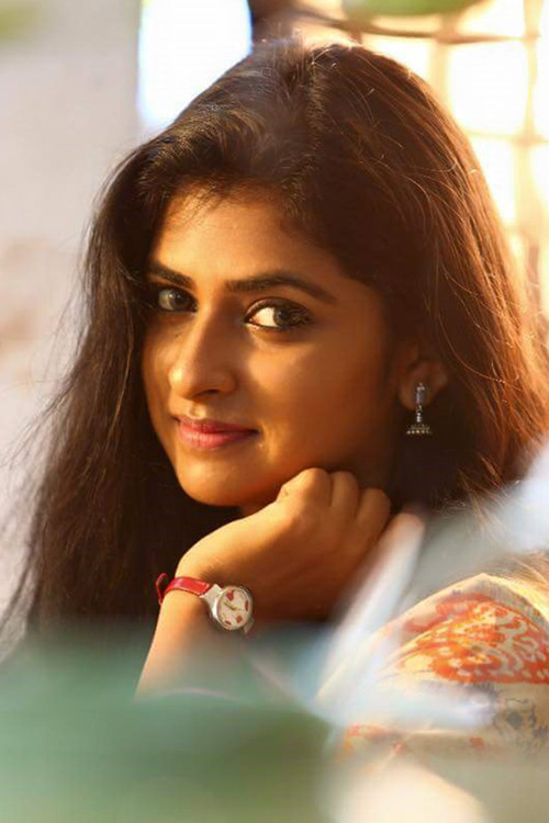 Parvathy Arun as 