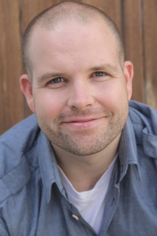 Daniel Van Kirk as Reggie Brown