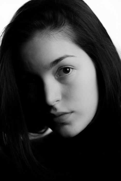 Liliana Bush as singer-bard