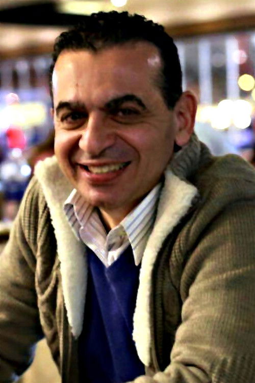 Ashraf Amin as Husam