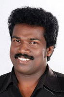 Binu Adimali as Man in the Cafeteria