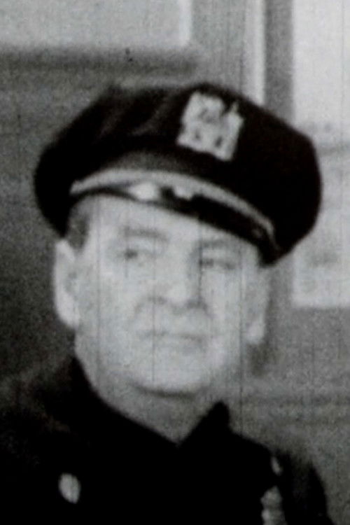 George Reynolds as Lt. of Police (Donovan)