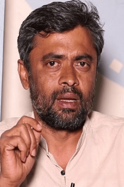 Sampath Maitreya as Mailuru Srinivas/Fernandes