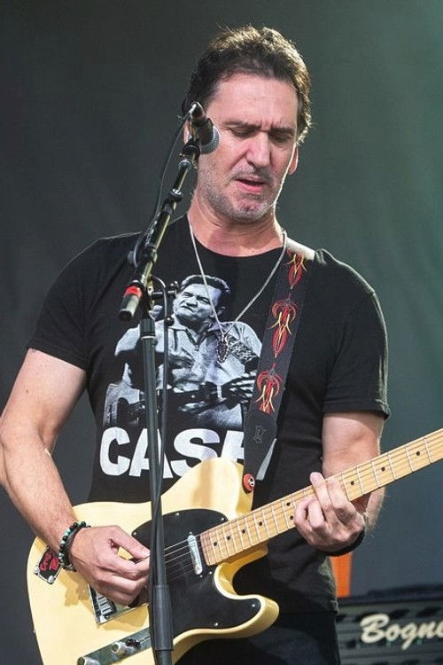 George Nastos as Guitars