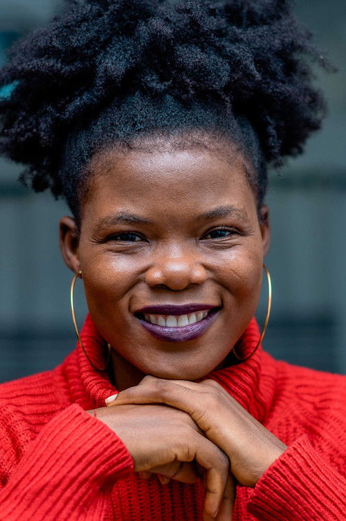 Nimo Loveline as Enanga Adele Asong