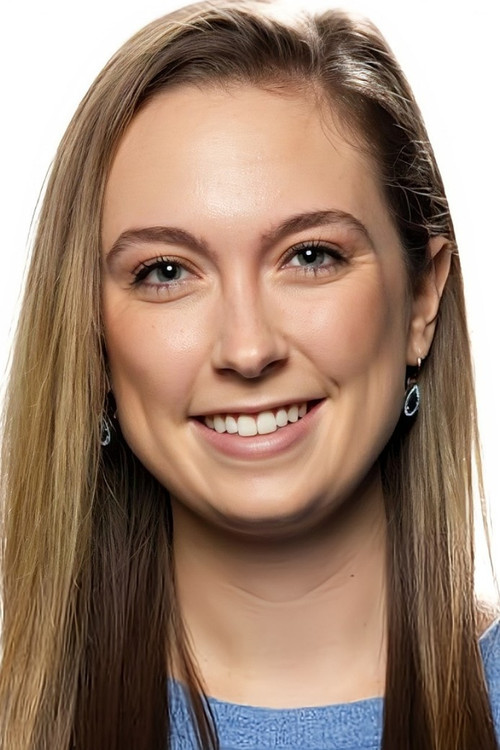 Madison Forsey as Self - News Anchor (archive footage)