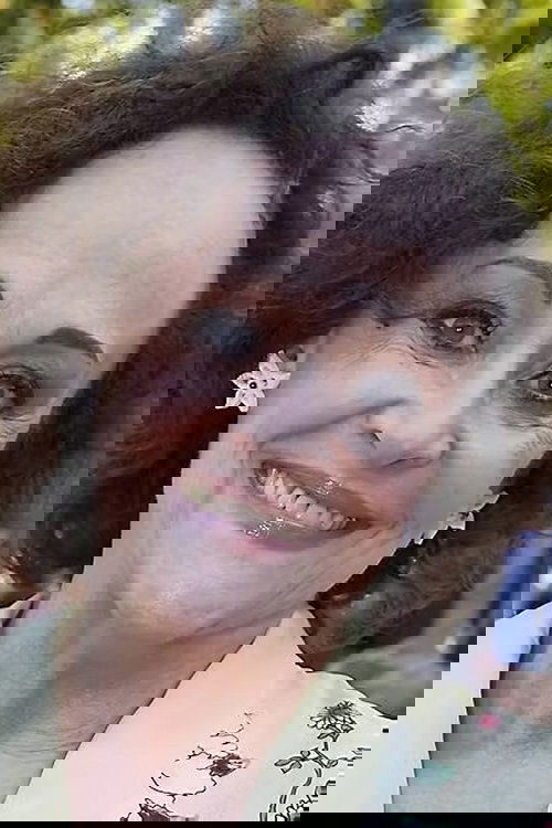 Kirsten Norholt as Daninvest Employee