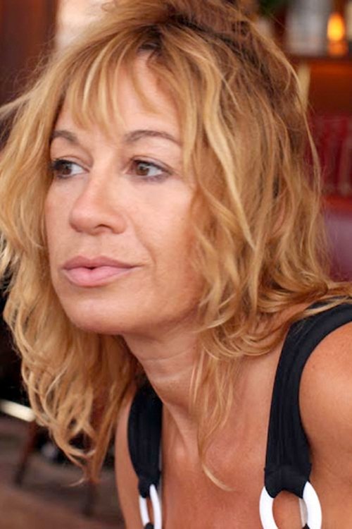 Nathalie Boileau as Denise, the make up artist