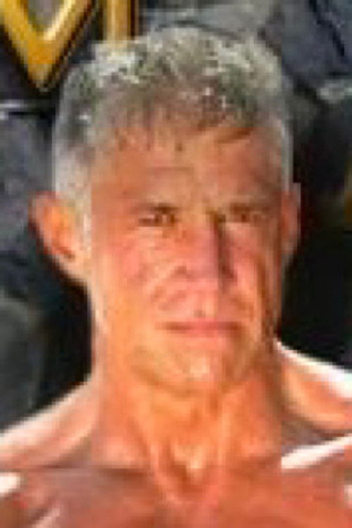 Derek Steel as (archive footage)