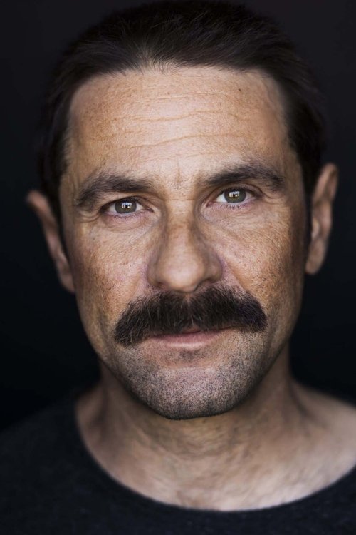 Michel Savard as Charles