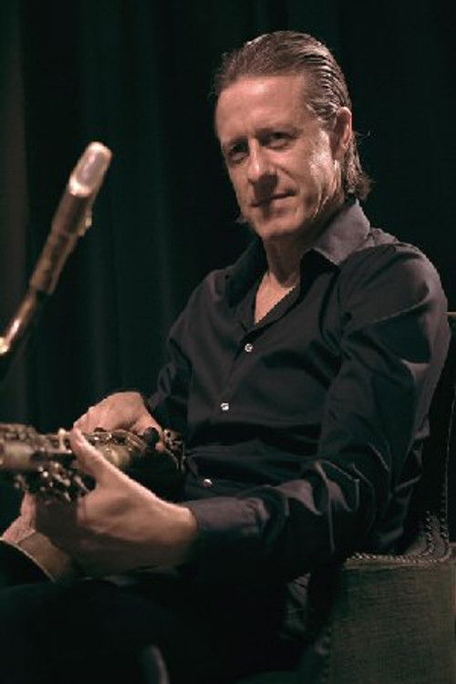 Norberto Fimpel as Sax, Percussion