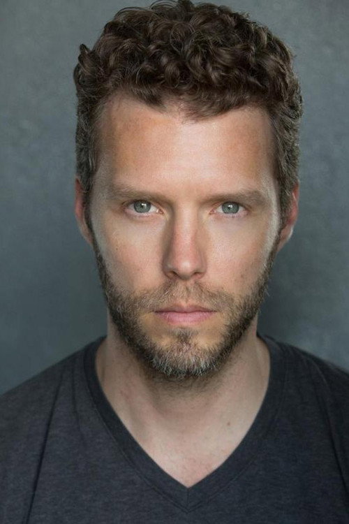 Adam Burkholder as Photographer 2