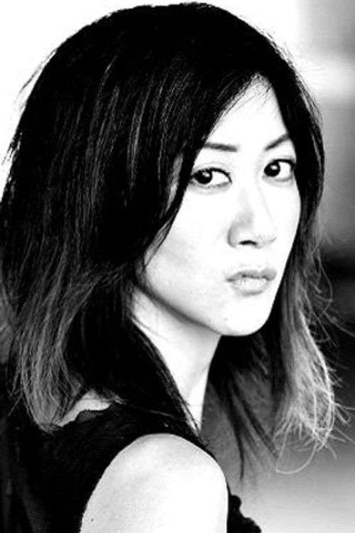 Betty Ouyang as Carol Chin