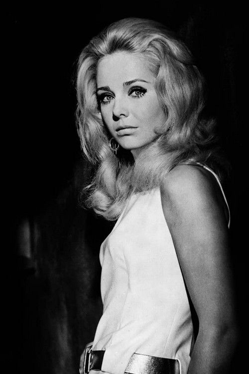 Karin Mossberg as Orange the Mistress