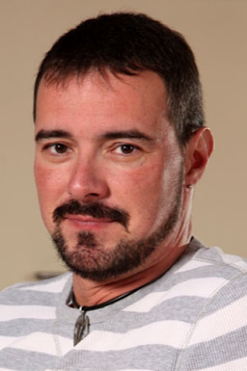 Jake Driver as (archive footage)