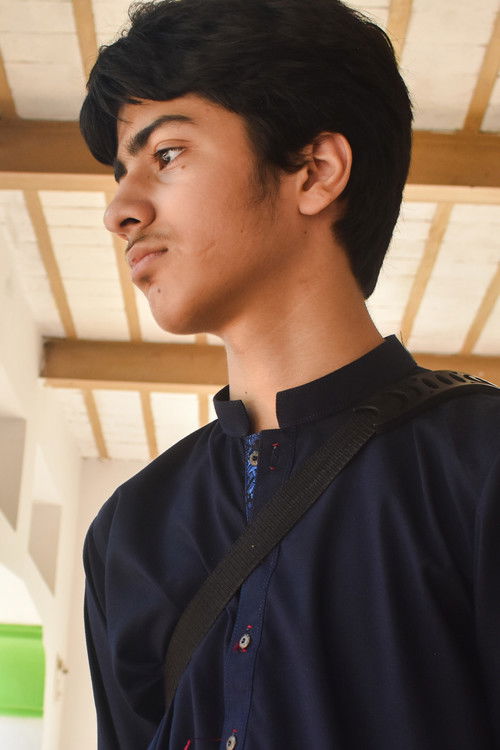 Kamran Ahmed Khan as Young boy