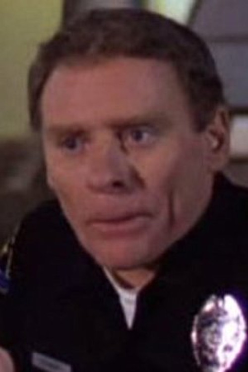 Bill Sorrells as Cop at Beanery (uncredited)